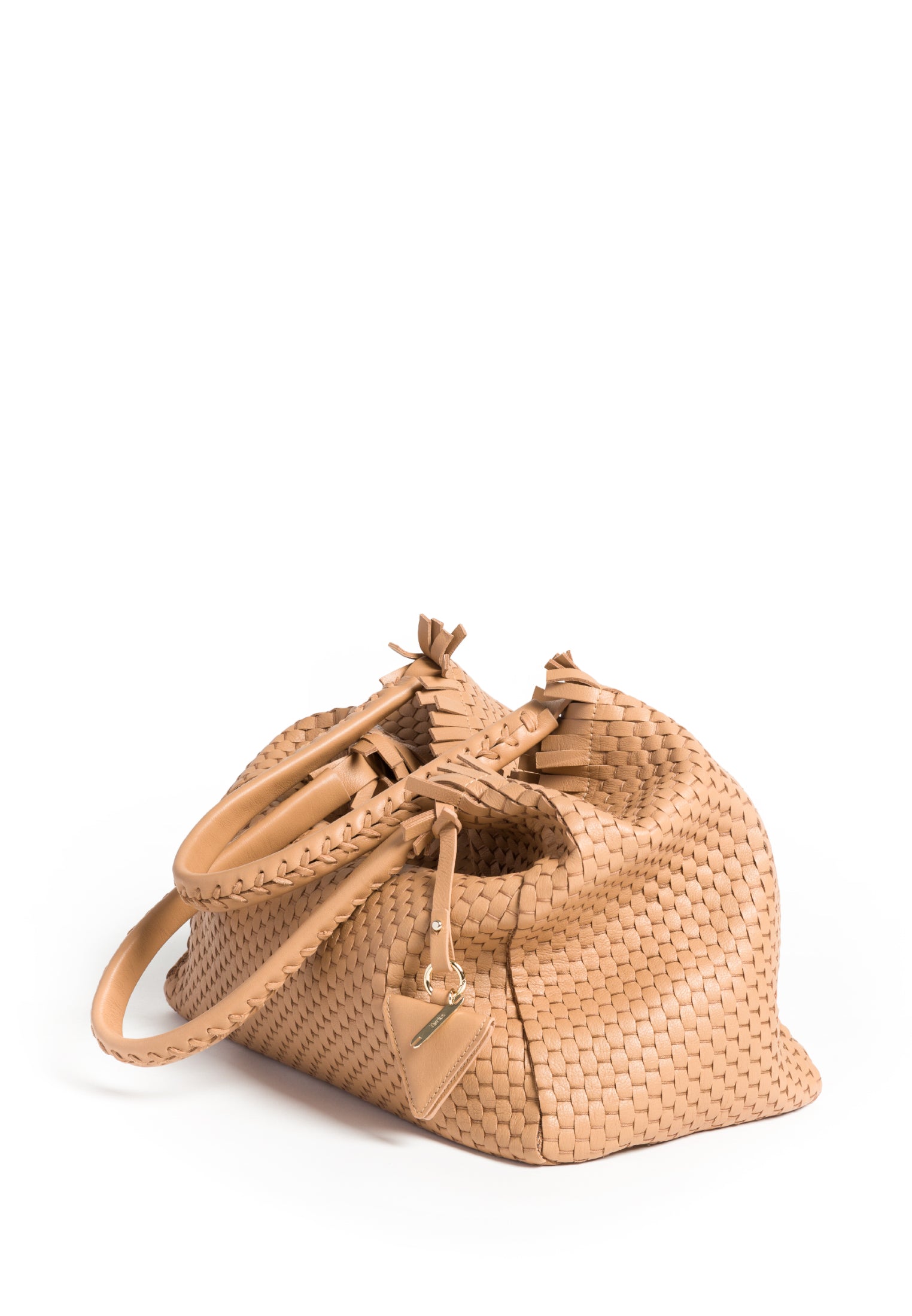 Close-up of the handle on the 09 Regular bag, showcasing the detailed weaving and durable craftsmanship