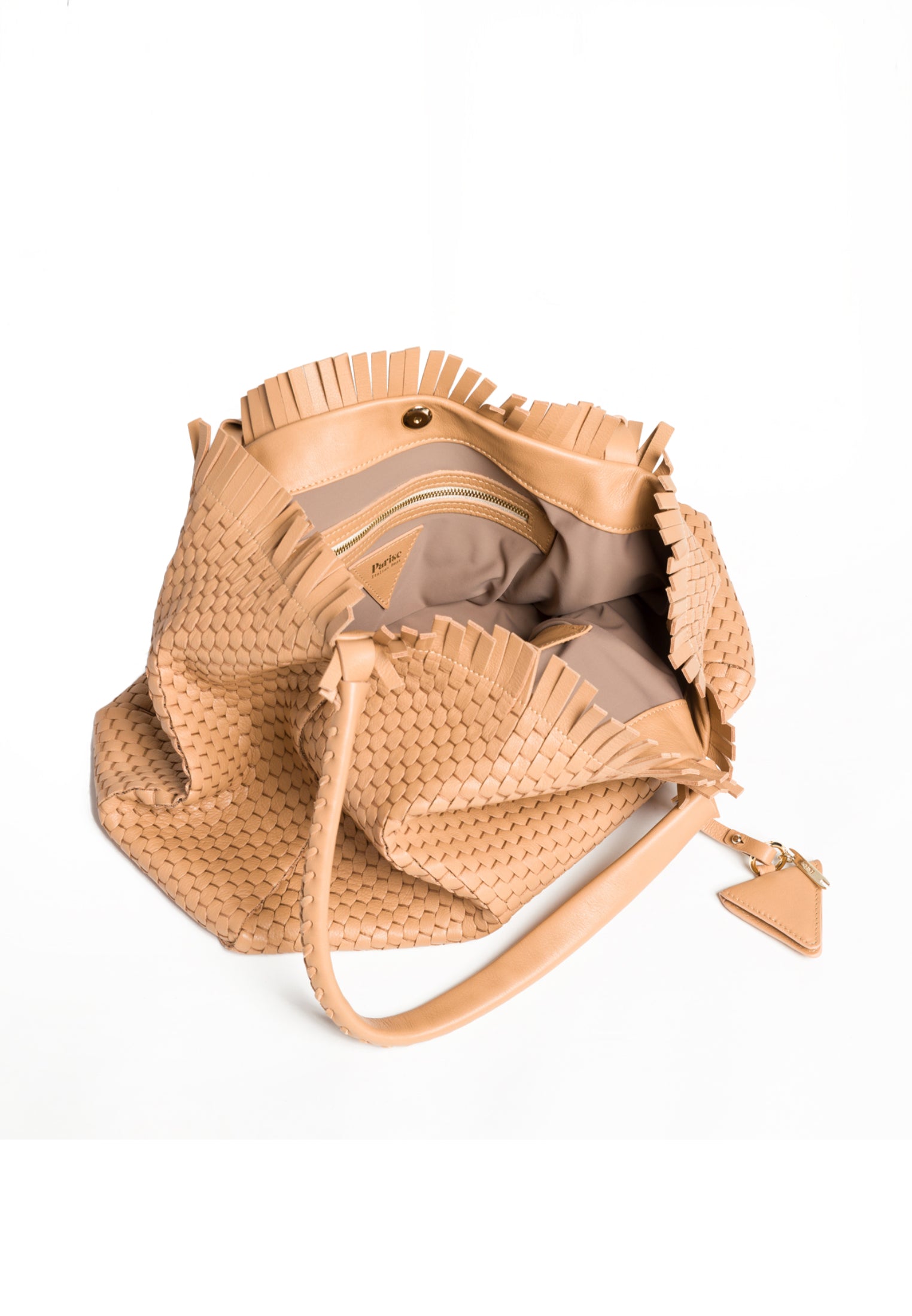 Interior view of the 09 Regular bag, displaying its spacious compartment and 100% cotton lining
