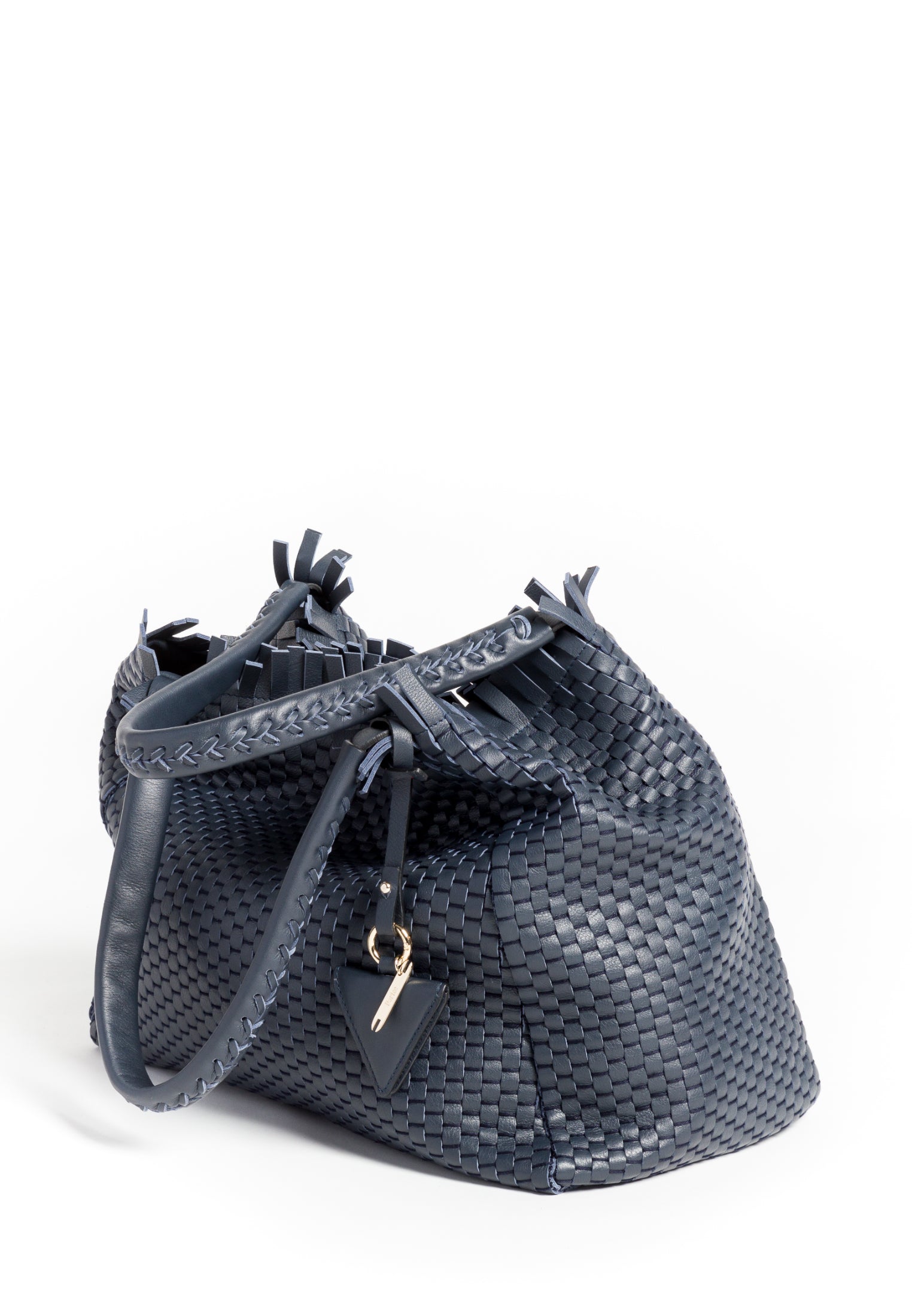 Close-up of the handle on the 09 Regular bag, showcasing the detailed weaving and durable craftsmanship