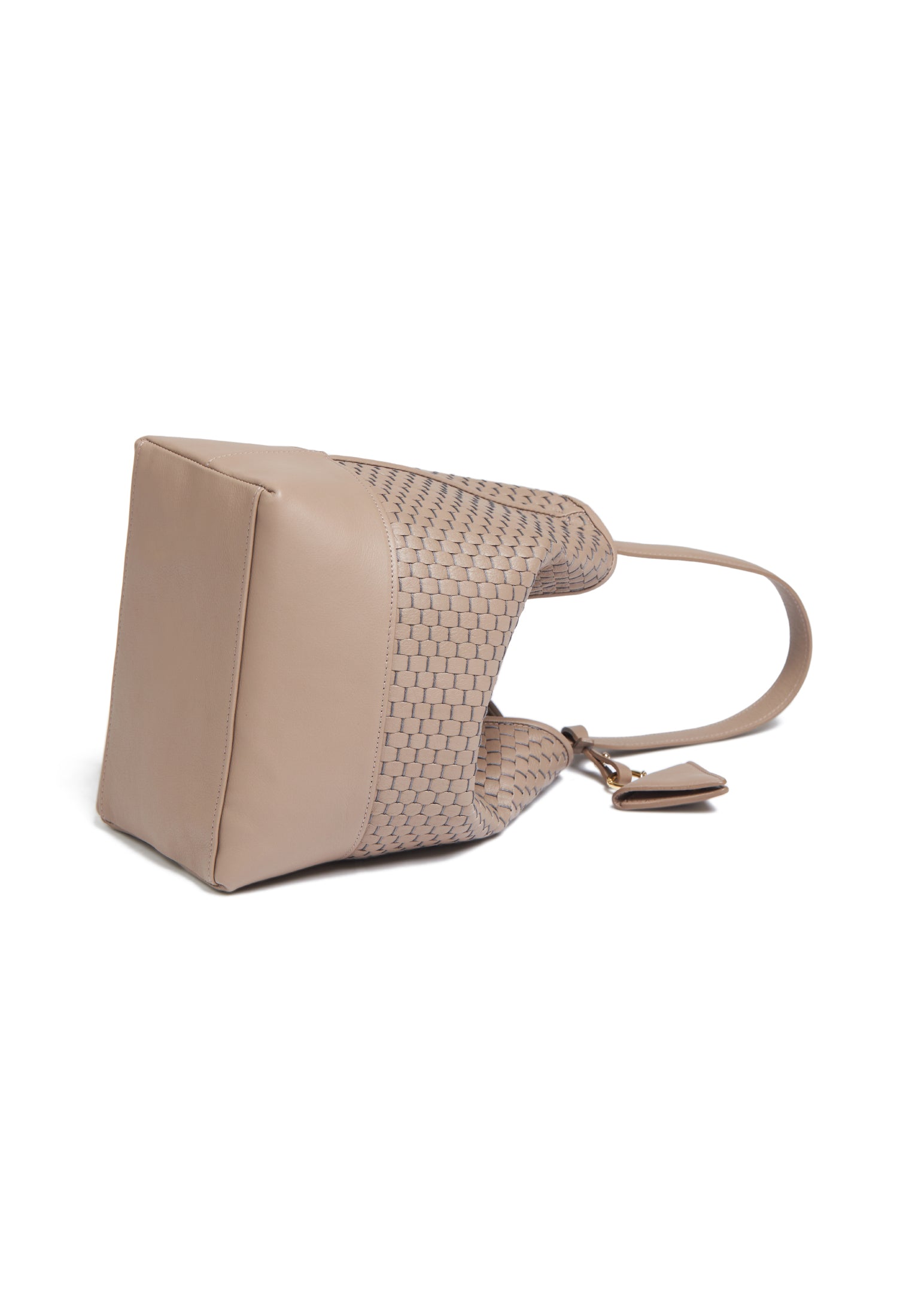 Flat view of the 51 Large Bucket bag with accessories, emphasizing its versatility and timeless elegance.