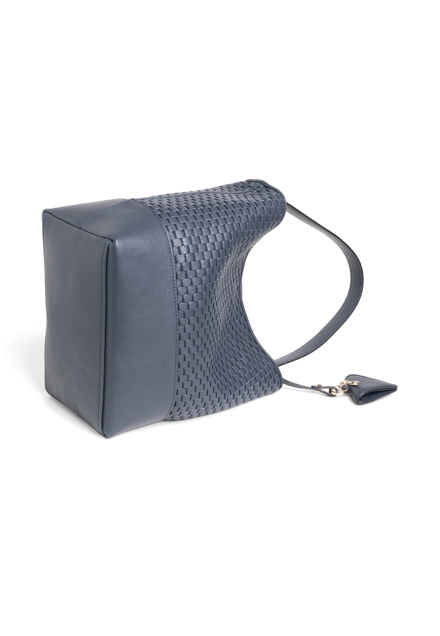 Flat view of the 51 Large Bucket bag with accessories, emphasizing its versatility and timeless elegance.