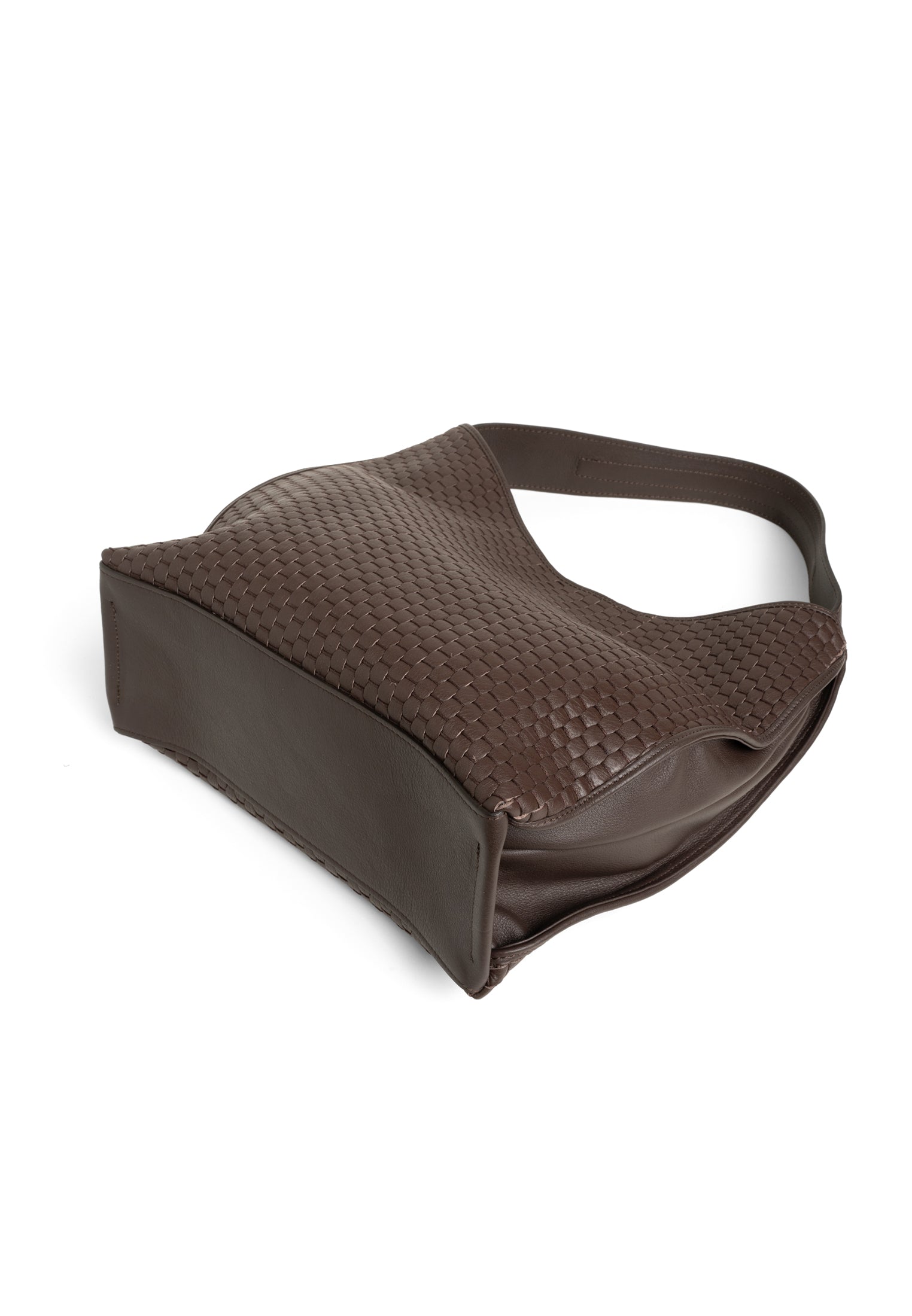 Flatlay of 697 hobo bag showcasing the ergonomic leather handle for comfortable carrying.