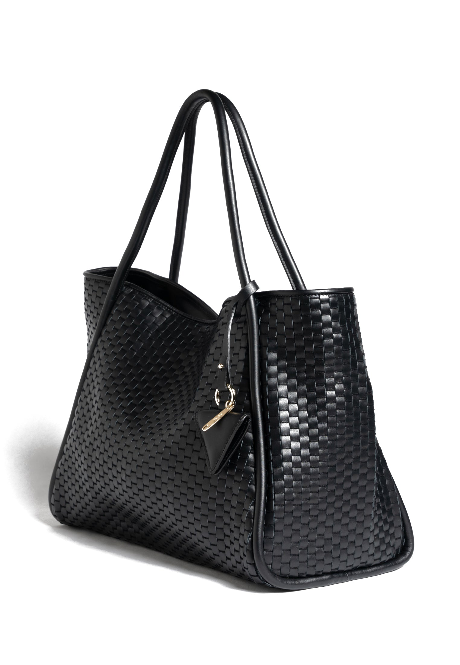Side profile of the '09' Tubolar Plain bag, showcasing its soft yet structured silhouette.