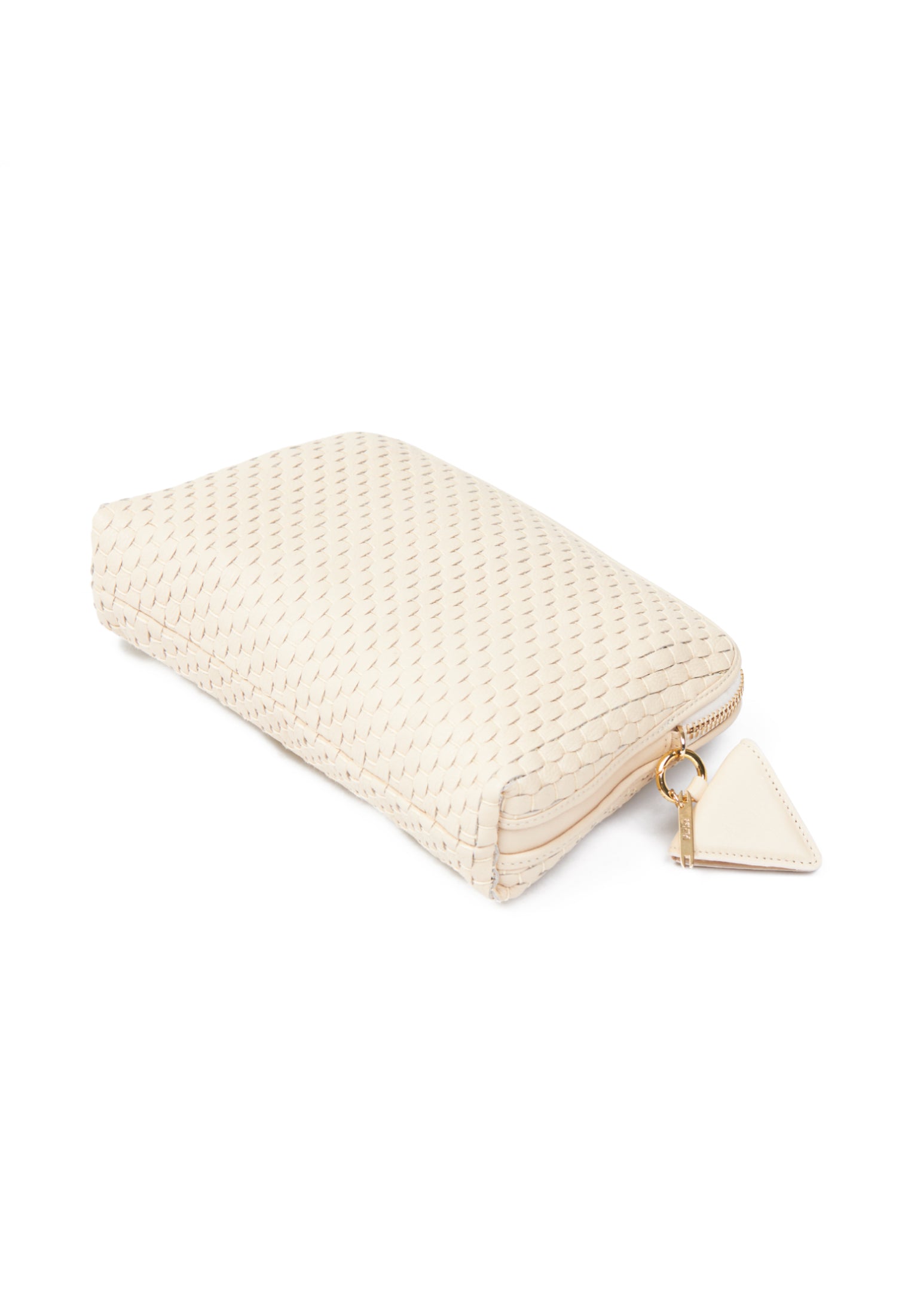 Flatlay of the 1789 crossbody bag in Burro with accessories, emphasizing its versatility and timeless elegance