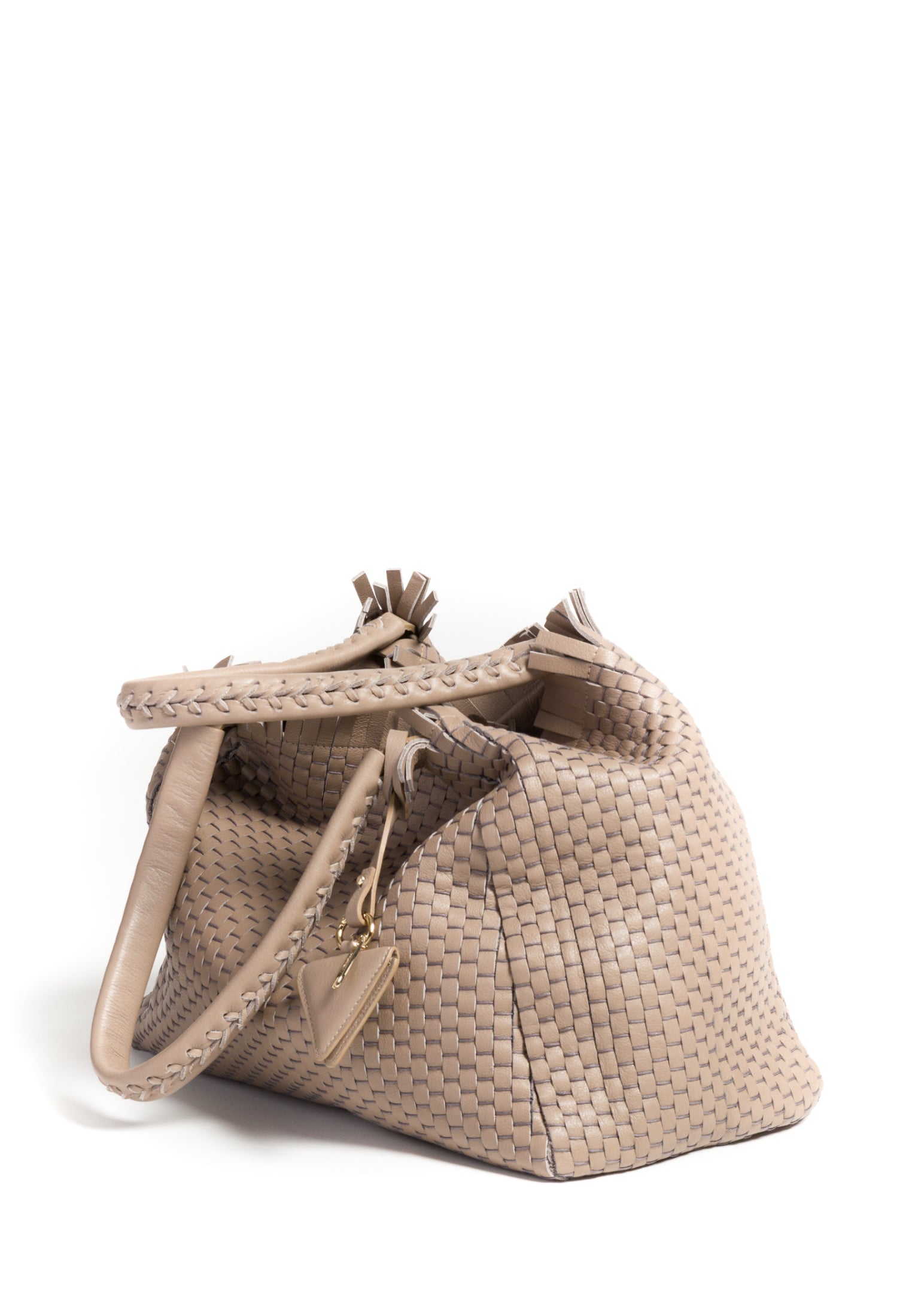 Close-up of the handle on the 09 Regular Acacia bag, showcasing the detailed weaving and durable craftsmanship