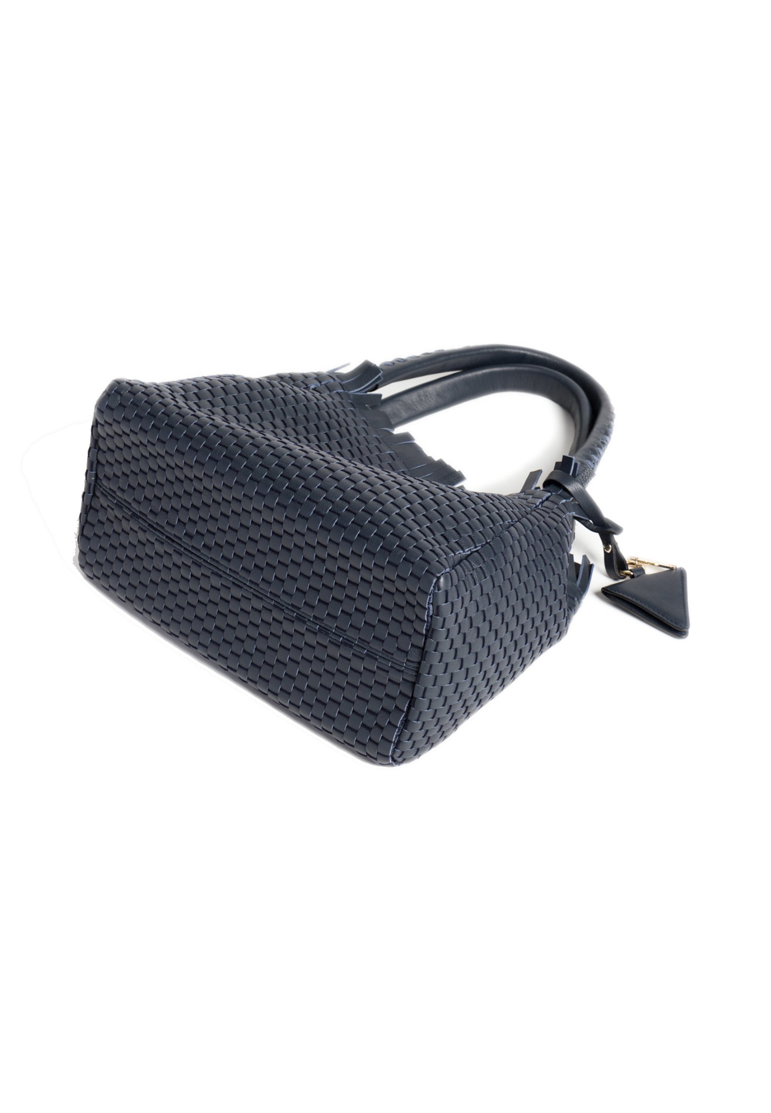 Flat-layout shot of the 09 Regular bag with its accessories, emphasising its versatility and timeless elegance.