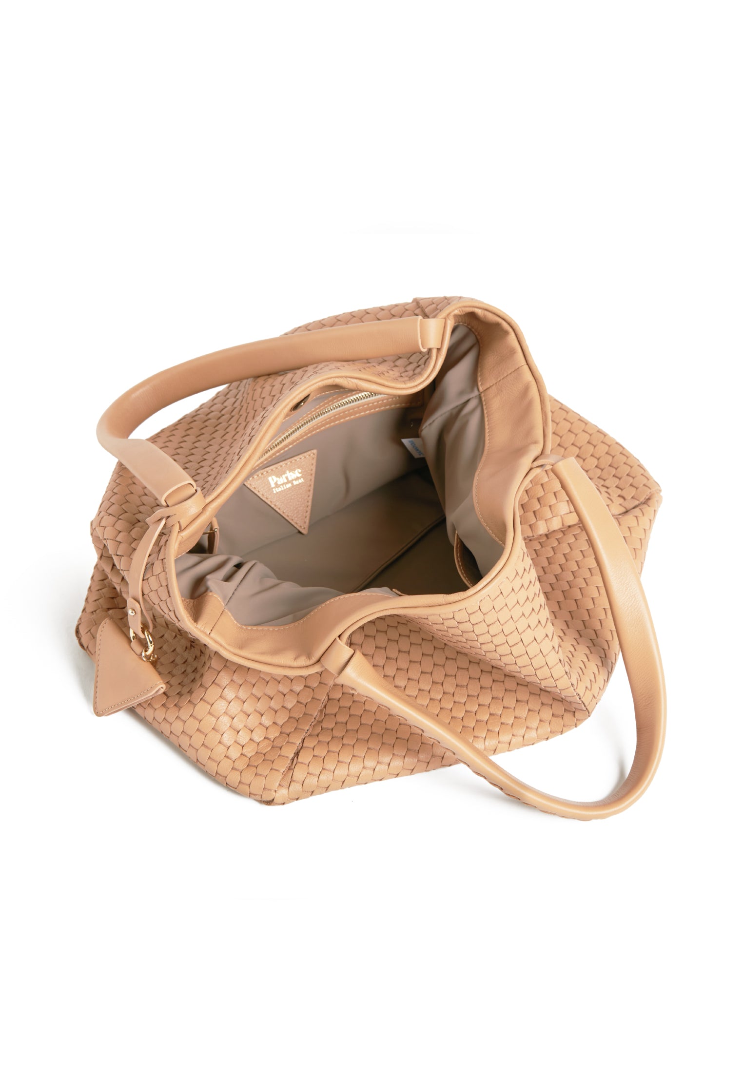 Interior view of the 09 Plain Camel bag, displaying its spacious compartment and 100% cotton lining