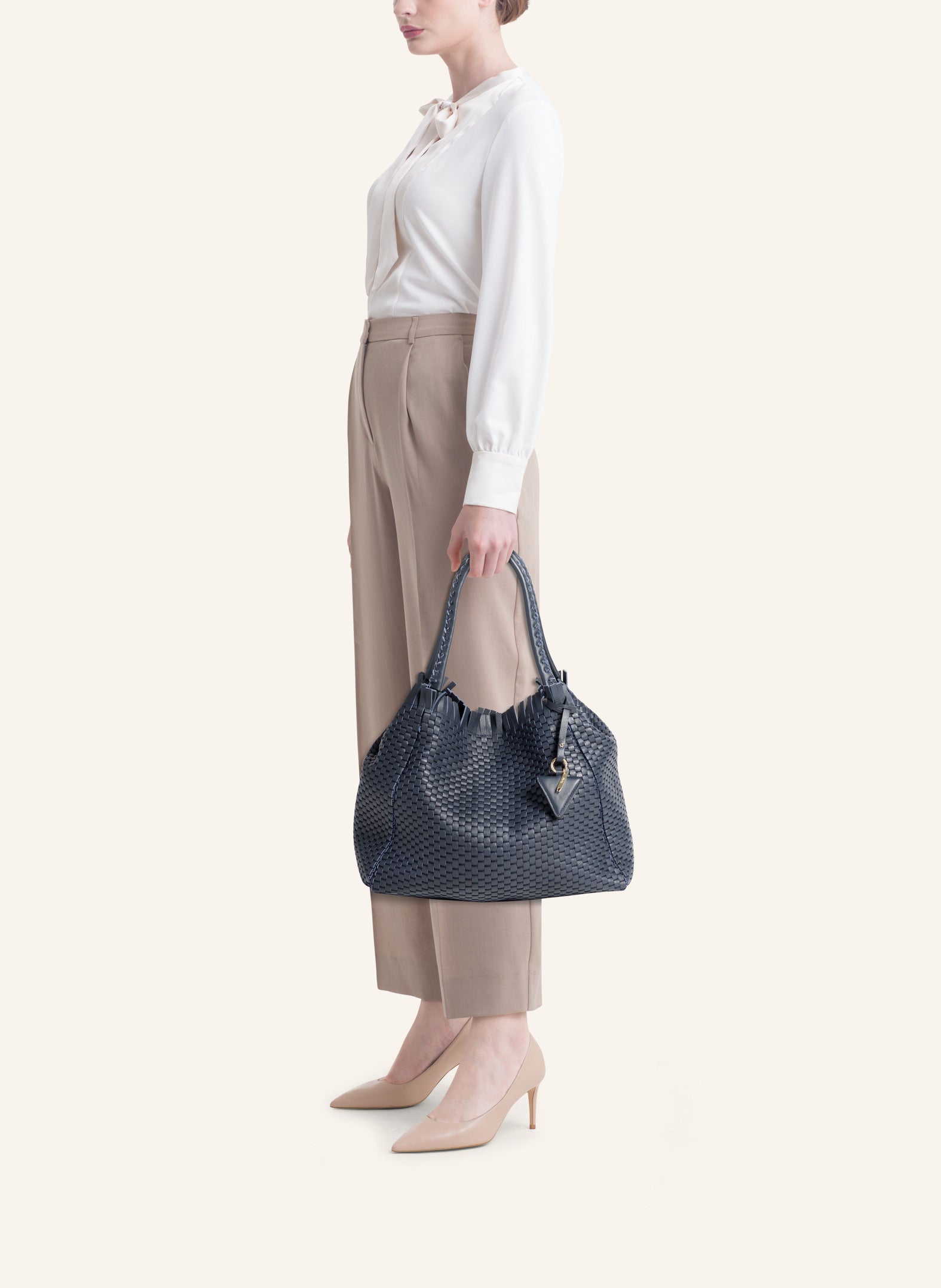 Parise 09 Regular bag styled with an outfit, demonstrating its versatility