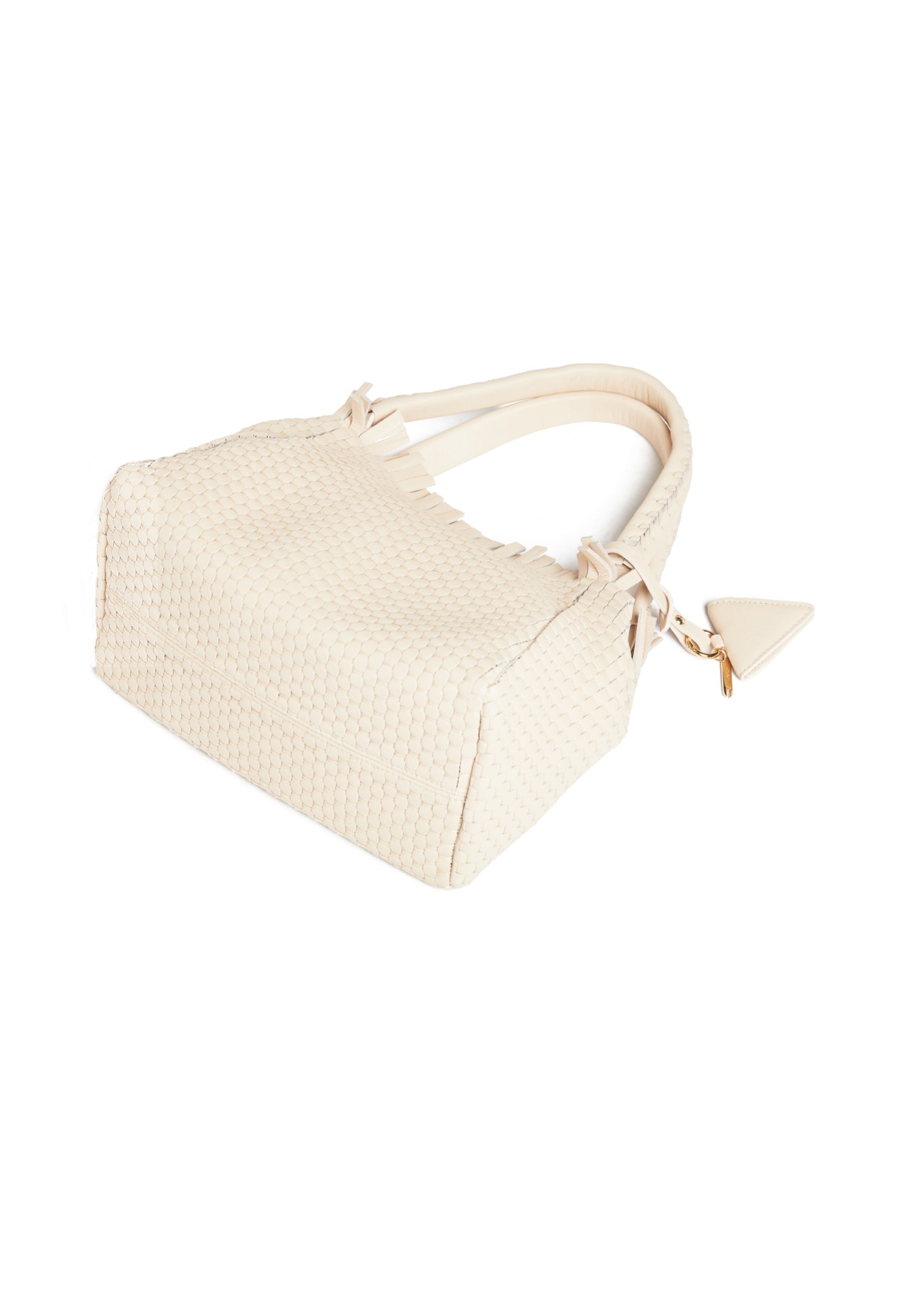 Flatlay of the 09 Small Butter bag with accessories, emphasizing its versatility and timeless elegance
